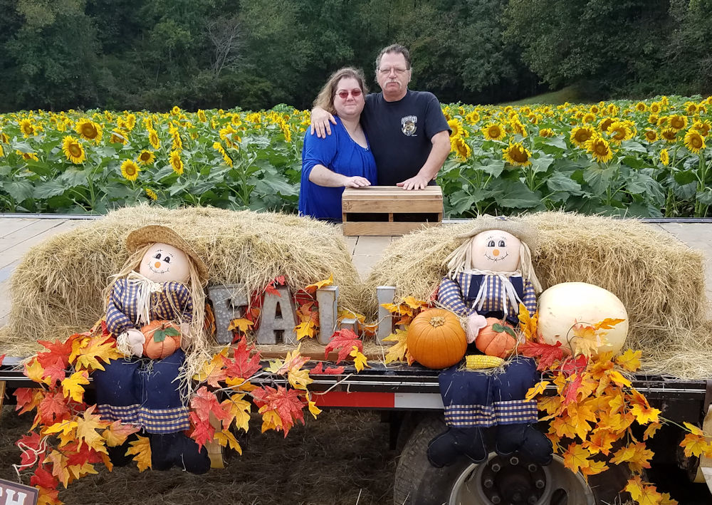 Edie and Joe Harvey in a sunflower field in Georgia October 2018 Edie and Joe Harvey in a sunflower field in Georgia October 2018